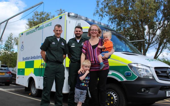 Keryn with sons, Torin, 3,and Keldan, 15 months, with Richard Garside, left, and Andrew Paterson