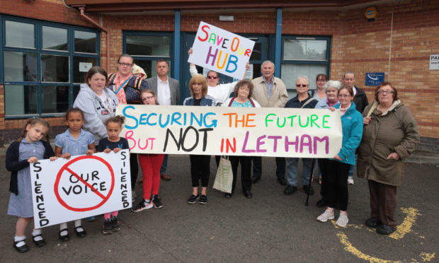 Letham locals protest outside Letham recreation Centre.