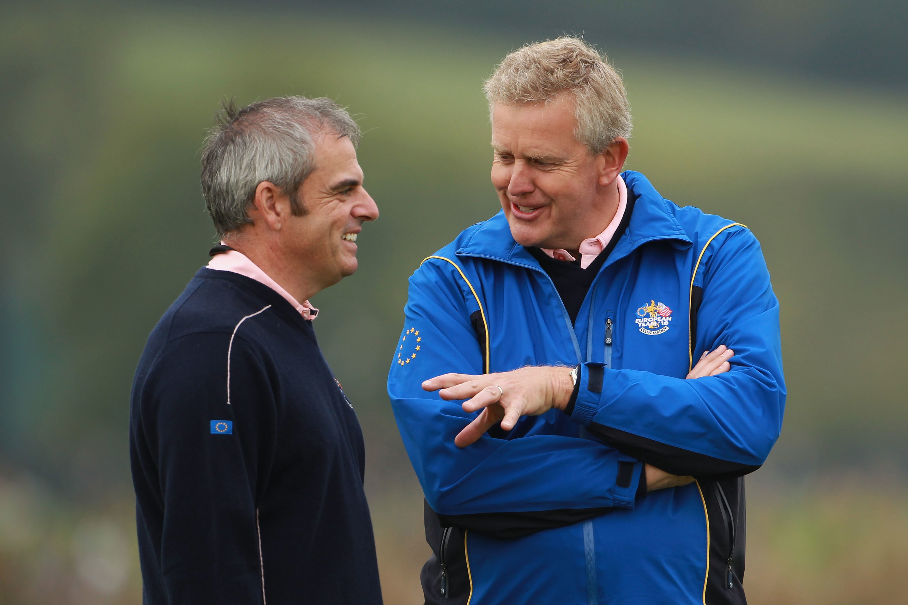 Colin Montgomerie and Paul McGinley talk tactics at the Ryder Cup at Celtic Manor in 2010.