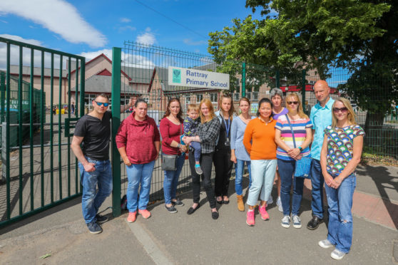 Parents outside school grounds with nursery entrance in background. Rattray Primary School, High Street, Rattray.