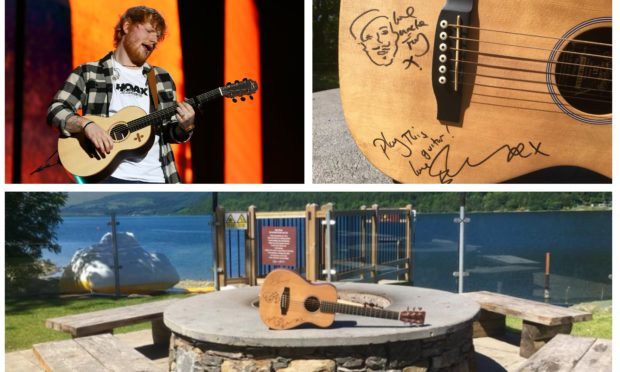 Ed Sheeran and the signed guitar at Tayside Marina.