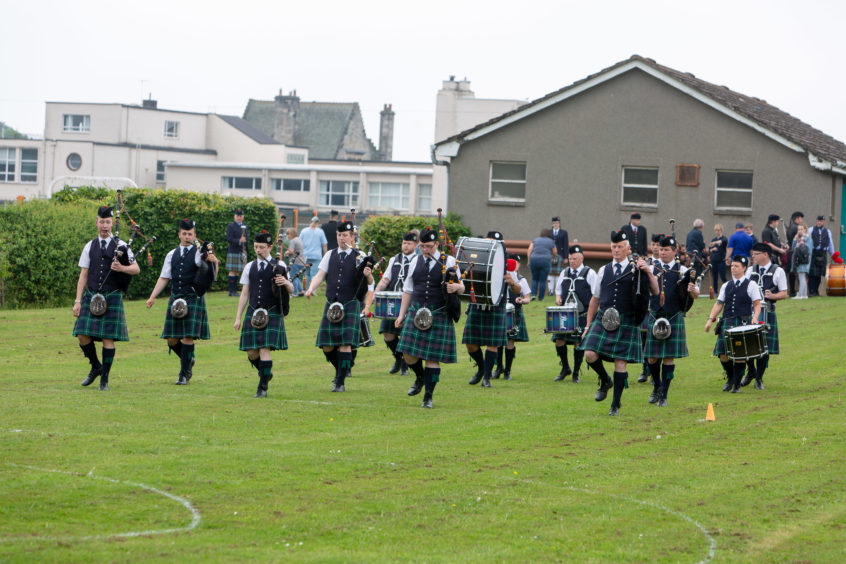 Cameron & District Pipe band play to the judges