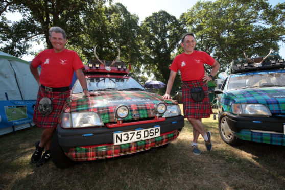 Gordon and Jo show off their cars