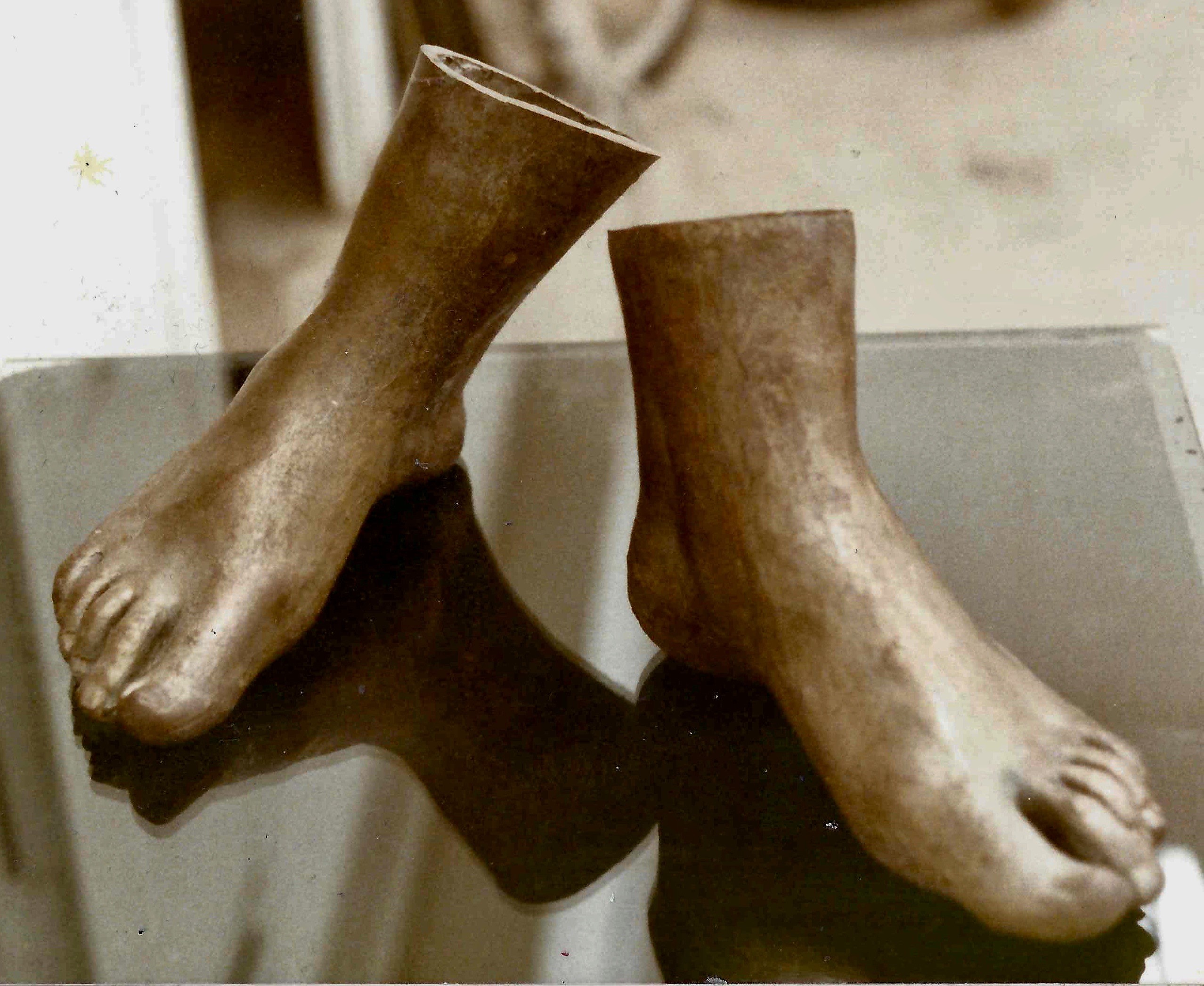 Judith's bronze feet.