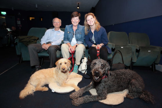 Waiting for the film to start are Keith, Debbie and Christina Gordon with Bonnie (left) and Cormac.