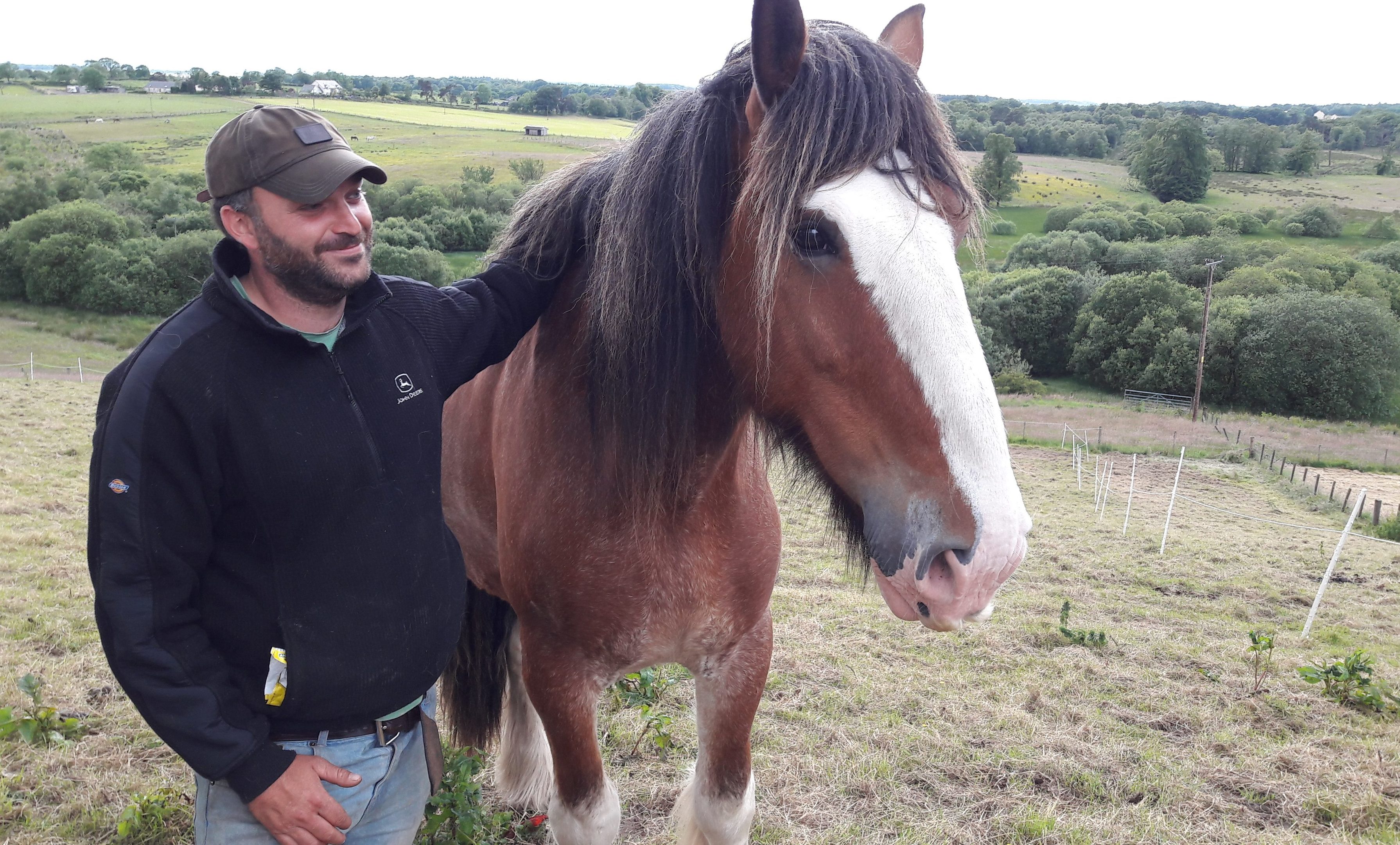 Tam Carroll  with 'Ollie' - the horse that 'saved his life'