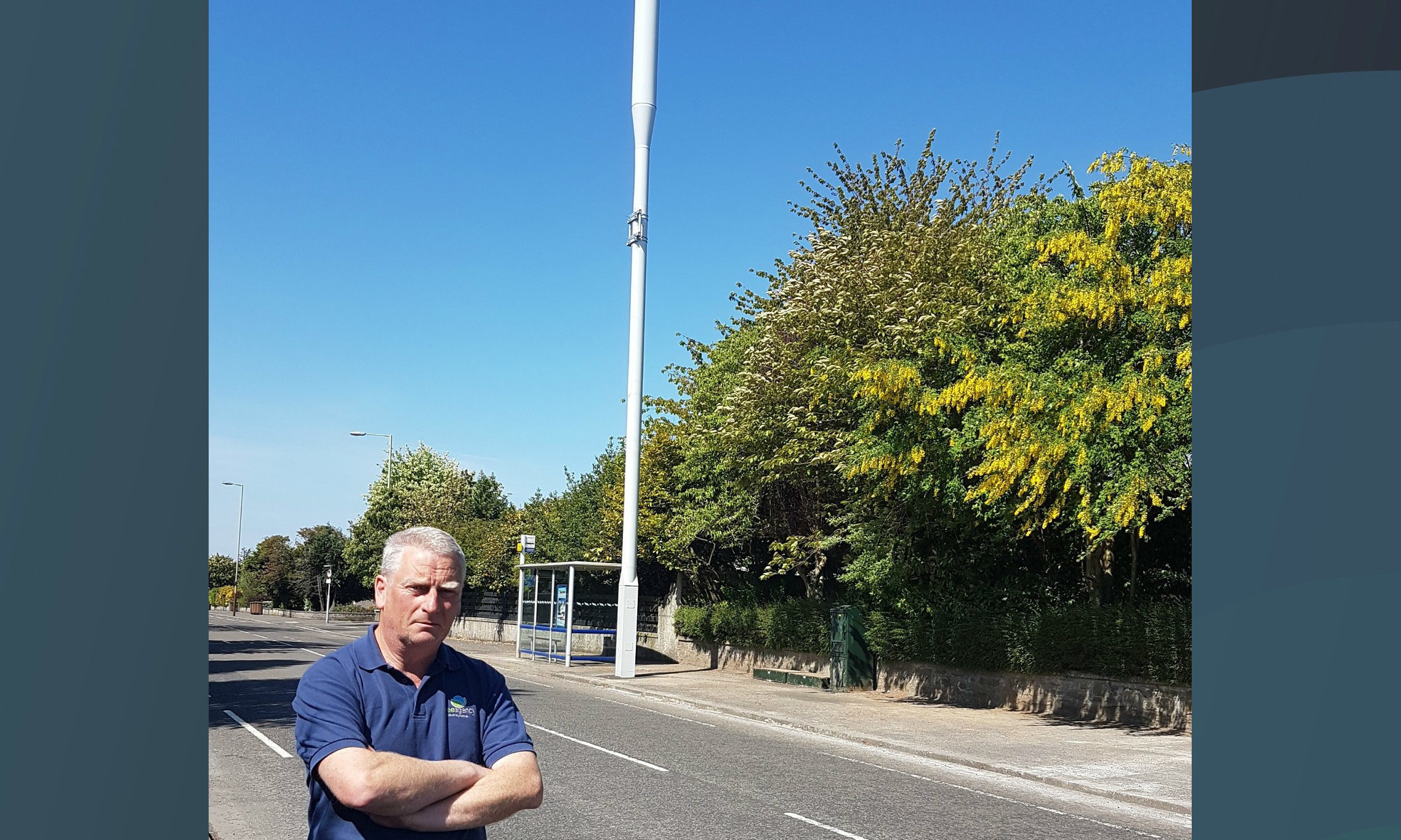 Councillor Craig Duncan with the mast on Strathern Road