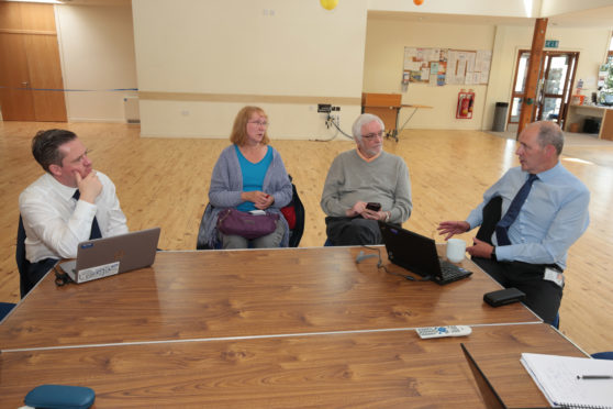 Auchterarder residents give their opinions on the traffic management plans for the 2019 Solheim  to David laing (left) and Ronnie Mellis (right) of Transport Scotland.