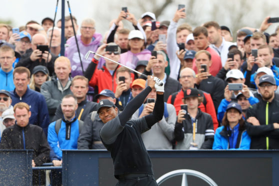 The galleries have stayed with Tiger Woods through two days of frustration.