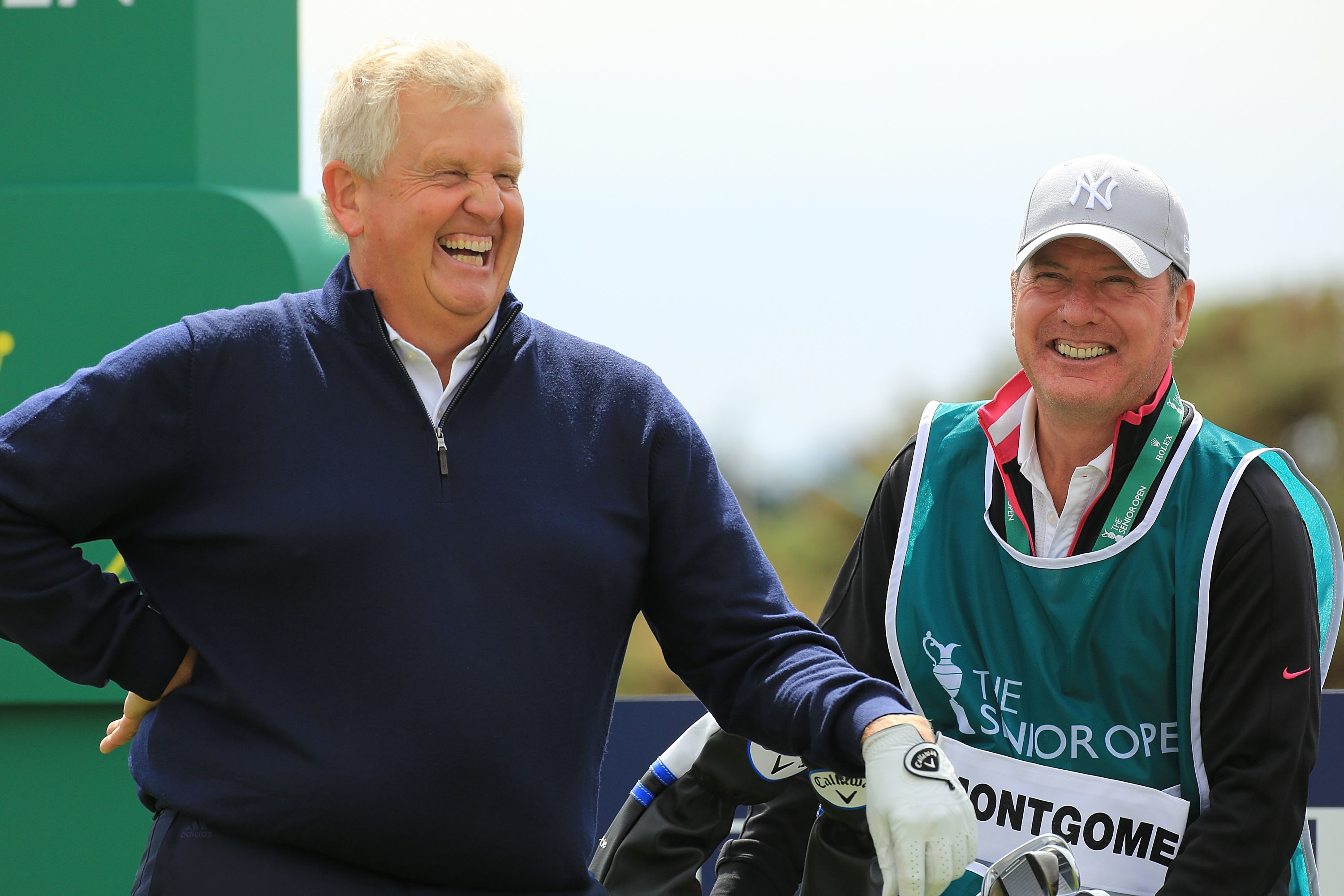 Colin Montgomerie of Scotland and caddy Alasatir MacLean in practice at st Andrews for the Senior Open.