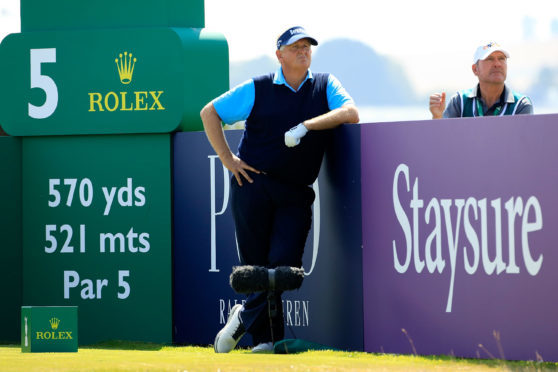 Colin Montgomerie in a lighter mood early in his second round at the Senior Open.