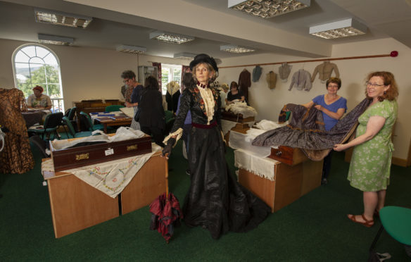 Museum curator Maria MacDonell(left) with members of the Costume Society of Scotland Gillian Ferguson and Mary-Claire MacFarlane