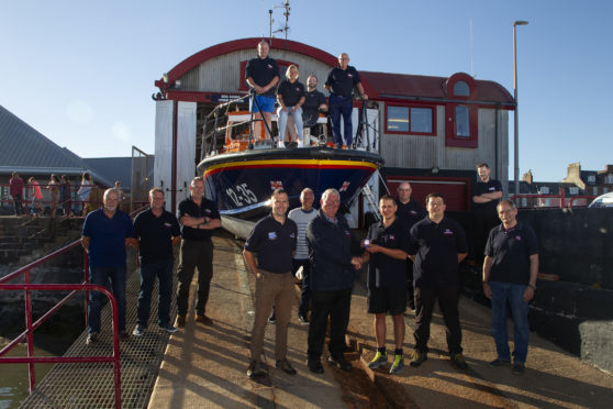 Arbroath RNLI crew with (front left to right): Area lifesaving manager Gavin Baird, operations manager Alex Smith, Peter Willis, Sam Clow and Ron Churchill.