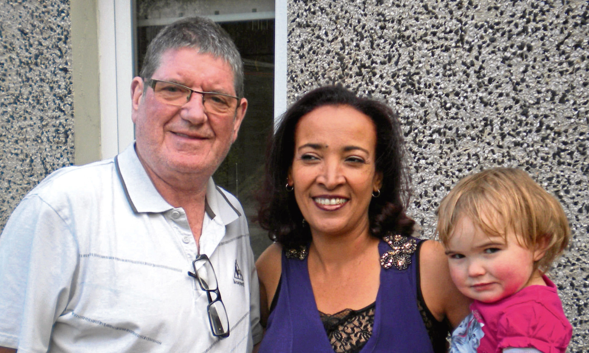 Nejat Buist from Dunfermline with her husband Ron and daughter Sabrina.