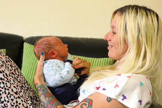 Antonia Dougan with her two day old son Bowie Davidson.