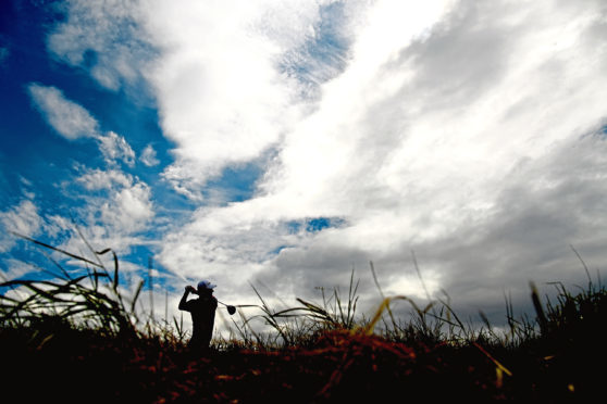 GULLANE, SCOTLAND - JULY 15: Justin Rose of England takes his tee shot on hole two during day four of the Aberdeen Standard Investments Scottish Open at Gullane Golf Course on July 15, 2018 in Gullane, Scotland.  (Photo by Harry How/Getty Images)