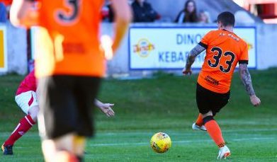 Fraser Aird opens the scoring for United.