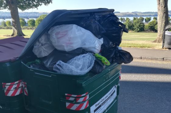 The overflowing Euro bins in the West End.