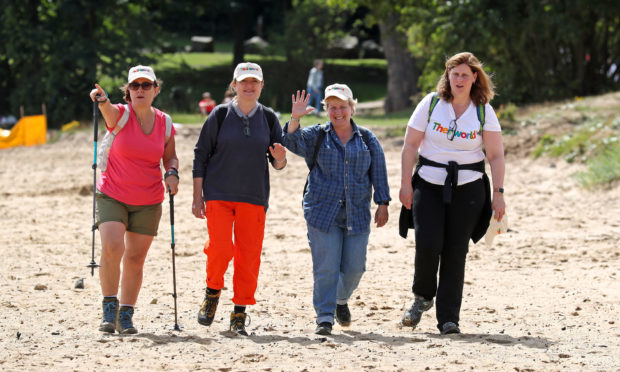 Charity campaigner Sarah Brown (right) with Great British Bake Off presenter Sandi Toksvig (second right), her wife Debbie Toksvig (second left) and actress Arabella Weir at Aberdour beach, as they continue along the 117-mile Fife Coastal Path.