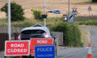 Police investigate following the crash on the A911.