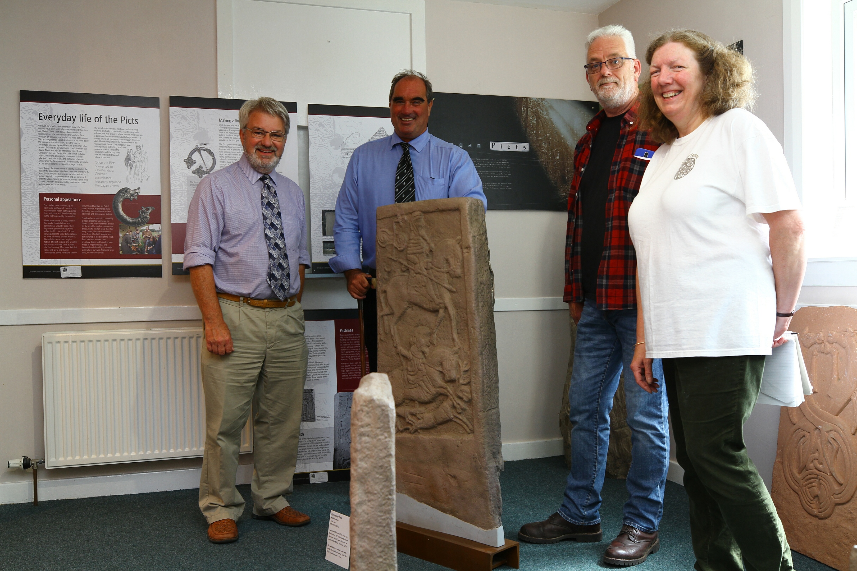 From left, Norman Atkinson OBE, Angus councillor Gavin Nicoll, Paul Duncan of the hall committee and Isabelle Davies, chairman of Aberlemno Village Hall Committee in the new Pictish Room.