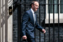 LONDON, ENGLAND - JULY 09: Dominic Raab leaves Number 10 Downing Street after being appointed Brexit Secretary by British Prime Minster Theresa May on July 9, 2018 in London, England. Last night David Davis quit as Brexit Secretary over his opposition to Mrs May's plan for the UK's future relations with the EU. (Photo by Jack Taylor/Getty Images)