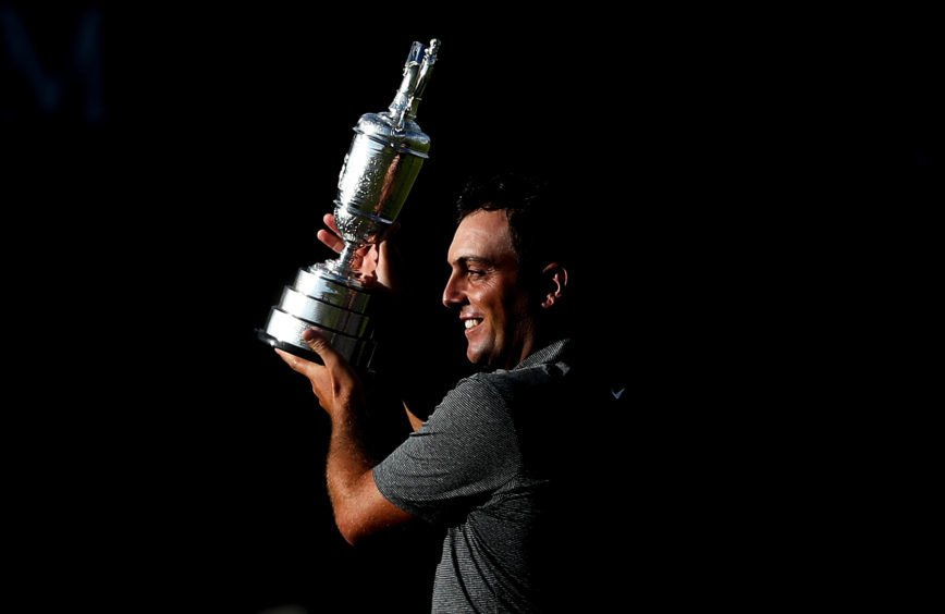 Italy's Francesco Molinari with the Claret Jug after winning the 2018 Open Championship at Carnoustie.