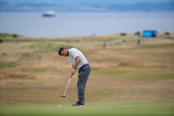 Peter Whiteford putts for birdie at the 16th during day one of the Aberdeen Asset Management Scottish Open at Gullane.