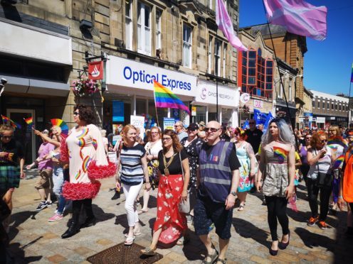 Marchers enjoy the sunshine along Kirkcaldy High Street