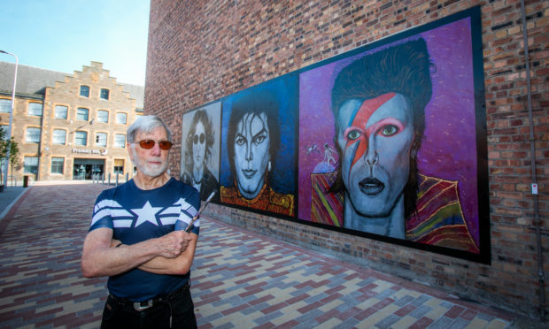 Artist Ian Cuthbert Imrie with his controversial rock star trilogy.
