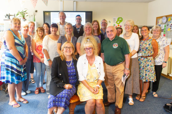 Courier News - Angus - Jim Millar story; CR0002735  The (MSCP) provides an innovative way of supporting people with mild to moderate dementia and their families through an evidence-based, person-centred approach. Picture Shows; the attendees at the meeting with front l to r - Professor Dawn Brooker and Dr Shirley Evans, Kirrie Connections, Bank Street, Kirriemuir, Thursday 26th July 2018