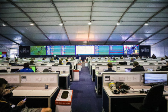 A busy media centre at the Open
