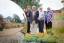 Dr Morag McFadyen, Provost Ronnie Proctor, Evelyn Bennett - Project Worker at Kirrie Connections and Prof Lesley Diack in the Dementia Garden. Tuesday, 10th July, 2018.