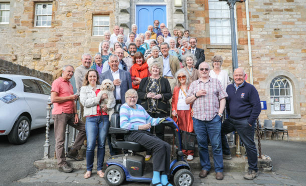 The group celebrate the librarys first birthday