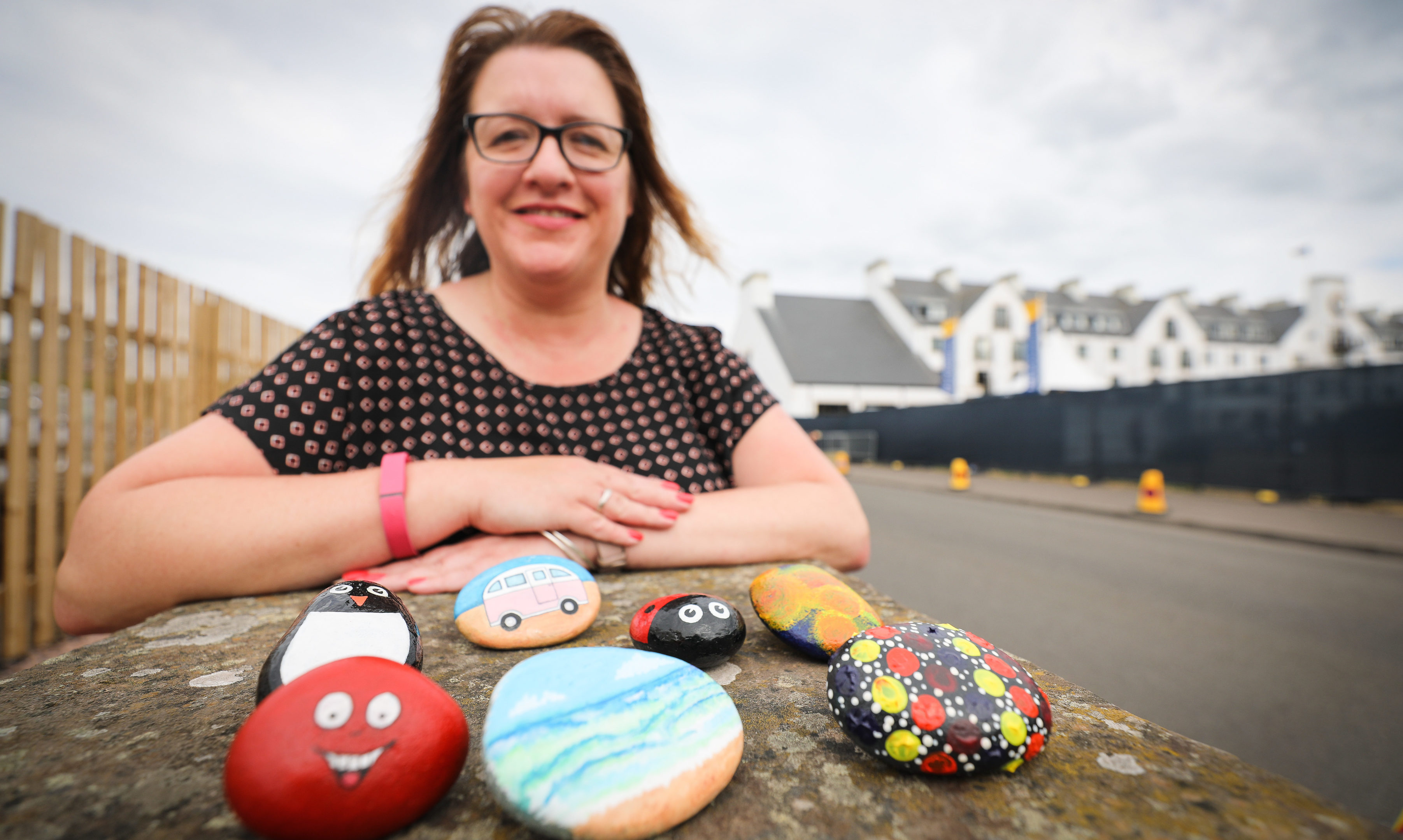 Emma Allan with non golf themed stones similar to the ones throughout town.