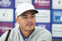 Rickie Fowler tuned up for Carnoustie playing a golf simulator.