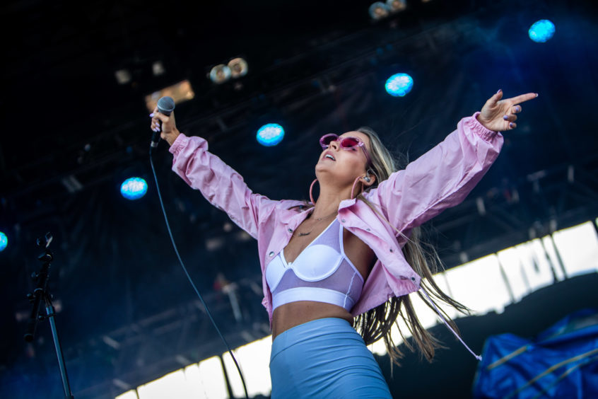 Hannah Jane Lewis plays as first support act to Rita Ora in Slessor Gardens.