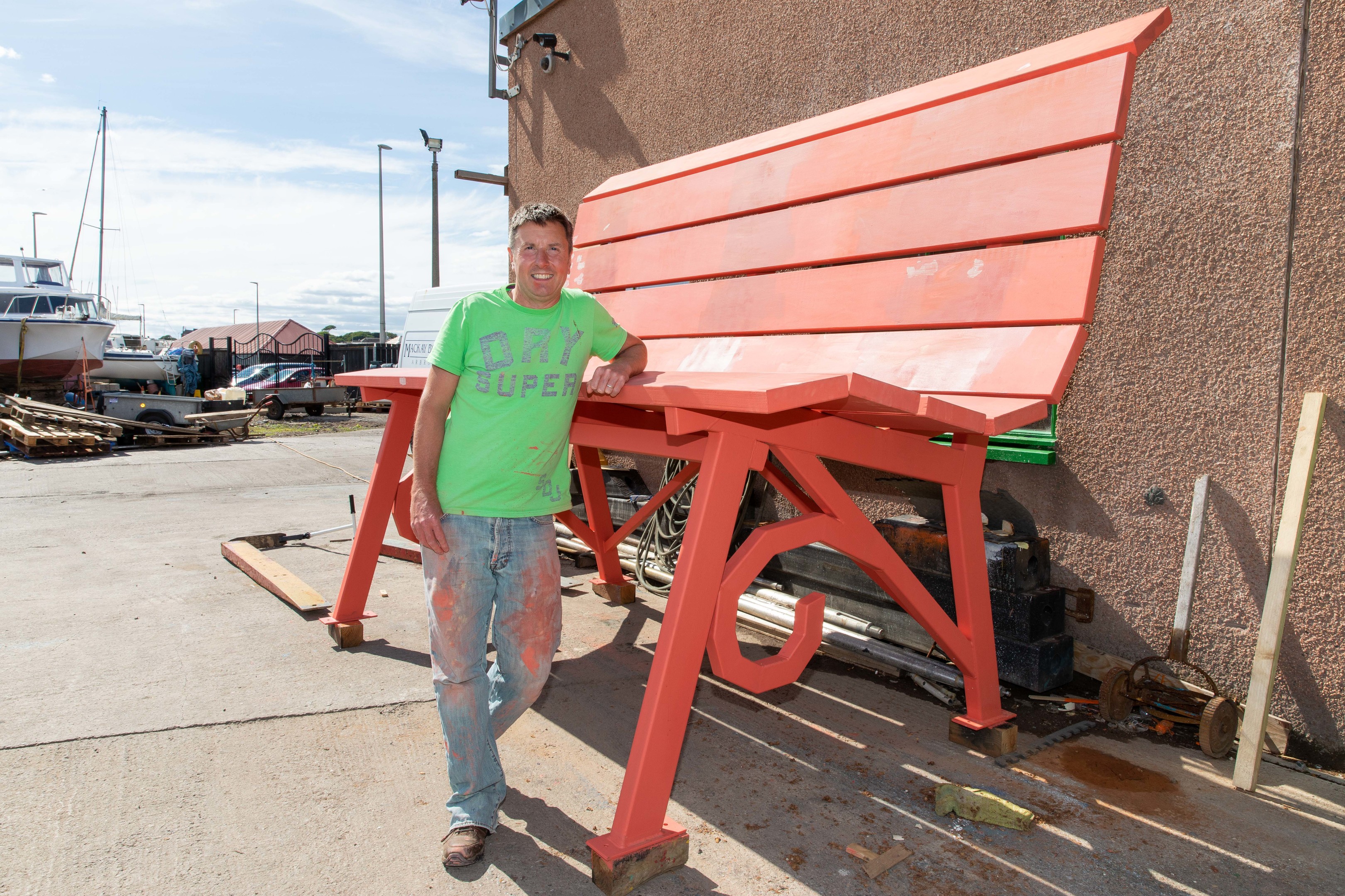 Organiser Scott Shortridge with the bench before it gets its final coat of paint.