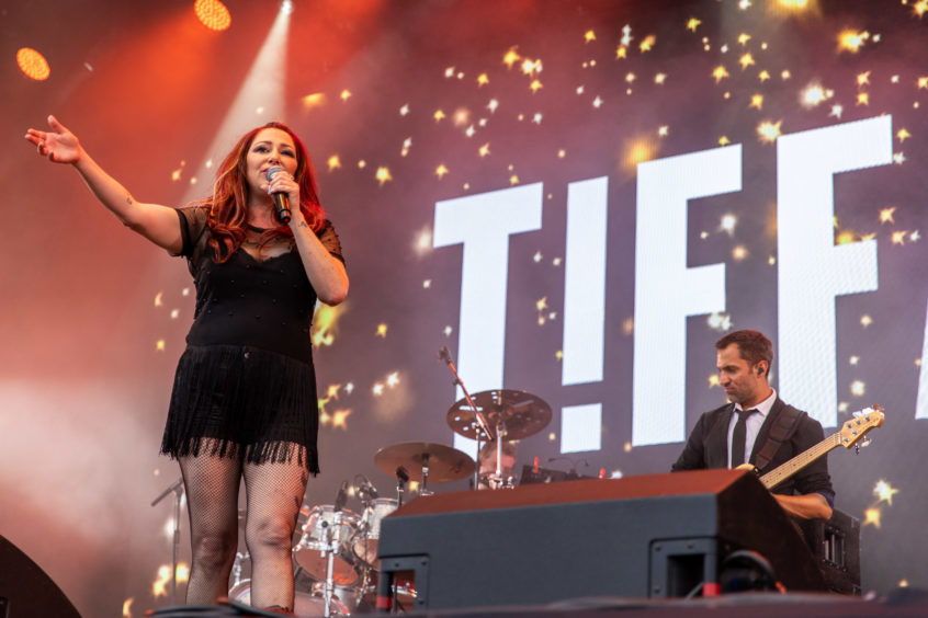 Pop icon Tiffany performing at Rewind Festival 2018.