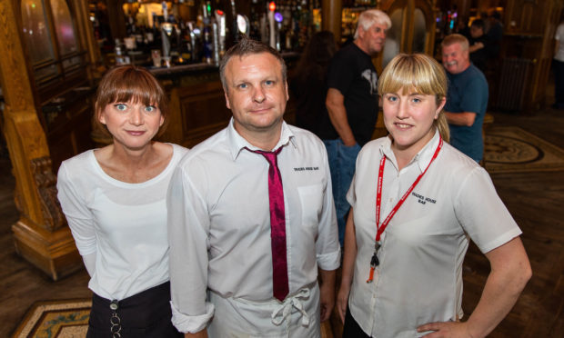 Trades bar staff, Paula Chevalier, Billy Meek & assistant manager Jackie Adam.