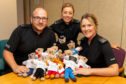 Officers Steven Piercy, Nicola Whitelaw and Brittany Primeau with the new Trauma Teddies