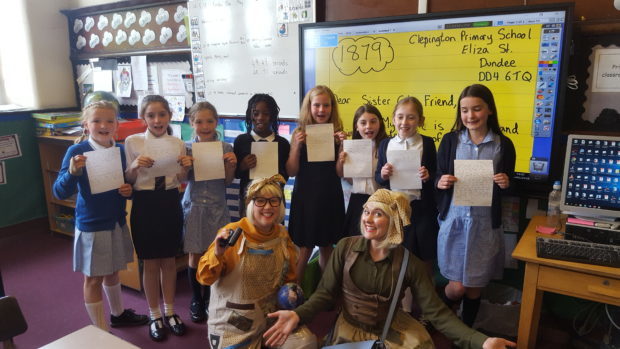 Dundee pupils with their pen pal letters.