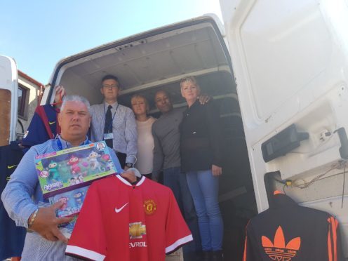 Cllr Tommy Stewart with (back left to right) Trading Standards team leaders, Ken McLeod and Vicky Hay with Tex and Carol Sampson of Sports Traider