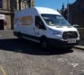 The van, advertising mobility aids, was spotted partially blocking a disabled bay and on double yellow lines.