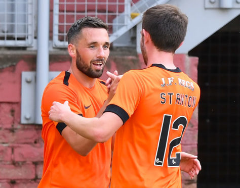 Nicky Clark celebrates his goal.