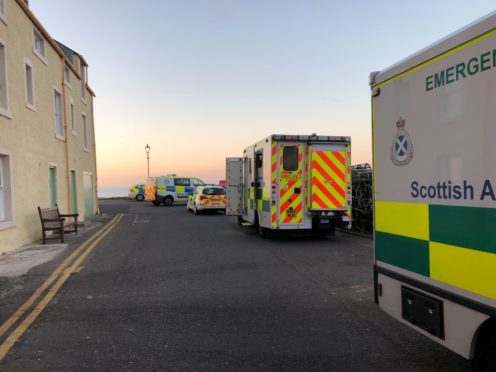 Police and ambulance at St Andrews pier.