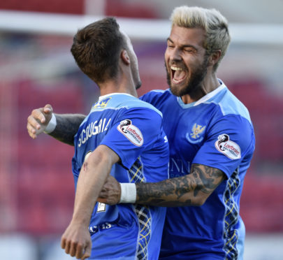 Richard Foster celebrates with Stefan Scougall.