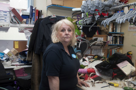 Oxfam shop manager Lynda Stuart is urging people to continue to donate to the Montrose shop.