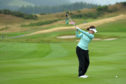 Back on the ball: New British Open champion Georgia Hall in practice for the European Team Championship at Gleneagles.