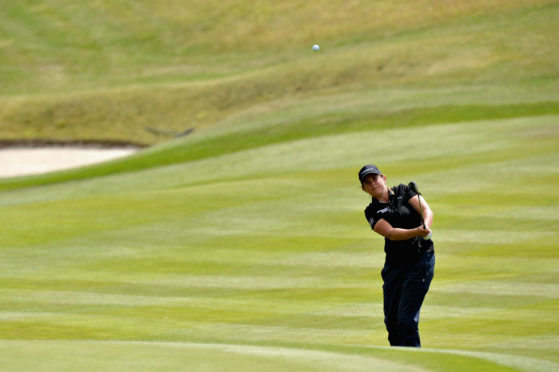 Michele Thomson hits her key pitch on the 18th to help her GB team reach the semi-finals of the European Team Championships.